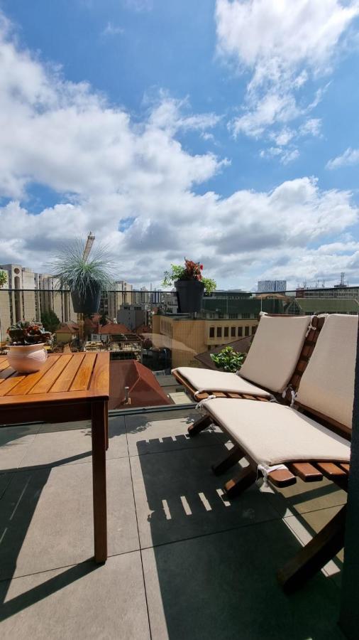 Апартаменты Penthouse Cosmopolit Брашов Экстерьер фото